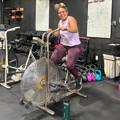 BFit505 member on air bike